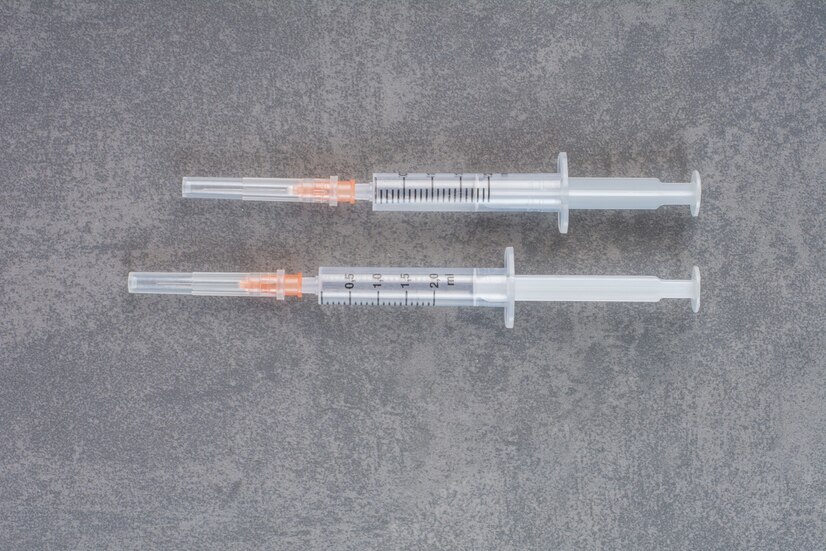 insulin-syringes-diabetes-marble-table_114579-22255
